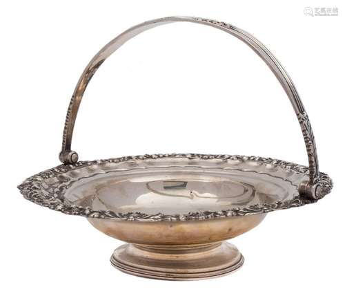 A George IV silver swing-handled cake basket, maker John & Thomas Settle, Sheffield,