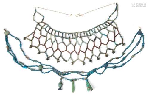 A bright blue glazed bead necklace with attached amulets, together with one other necklace,