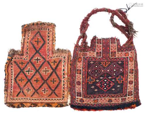 A Belouchistan saddle bag:, the indigo face with triple lozenge and cruciform medallions,