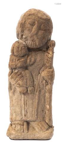 A Medieval carved limestone figure of St.