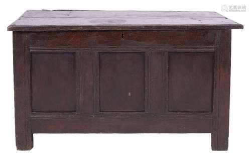 An 18th Century oak rectangular coffer:, with a hinged plank top and channel moulded edge,