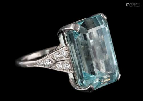 An aquamarine single-stone ring: the rectangular aquamarine approximately 17.