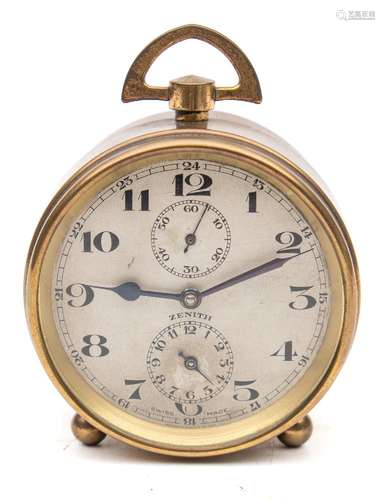 A small brass Zenith clock: having an eight-day duration timepiece movement,