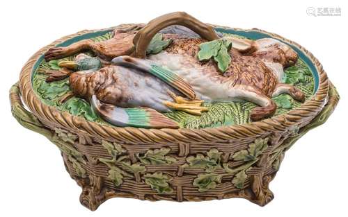 A Minton majolica game pie dish and cover: the cover moulded with dead game on a bed of ferns,