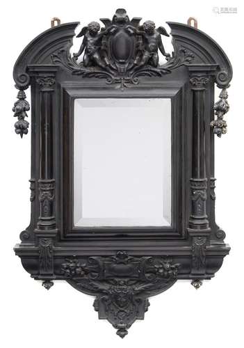 A 19th Century Italian carved and ebonised wall mirror:,