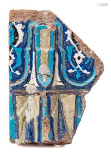 A polychrome tile fragment, possibly Damascus,: 20 x 14cm overall.