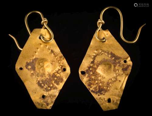 A pair of lozenge-shaped embossed gold mounted drop earrings: the drops probably of ancient