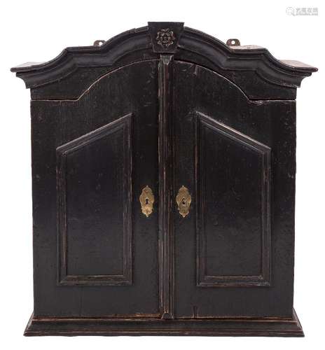 An 18th Century Dutch stained pine hanging domed cabinet:,