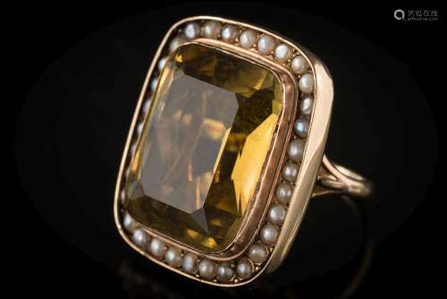 A rectangular citrine and cultured seed-pearl cluster ring: the rectangular citrine approximately