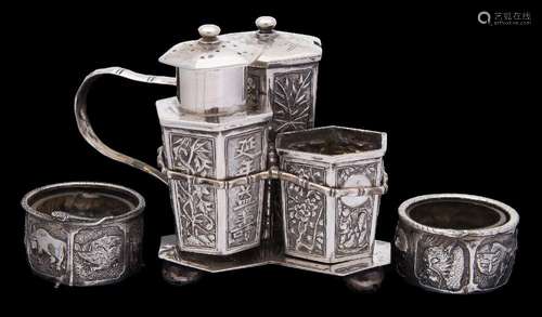 A Chinese silver cruet stand with cruets, maker Luen Wo,