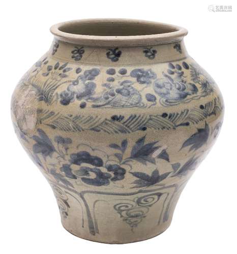 A Chinese blue and white 'fish' jar: of compressed globular form with rolled rim,