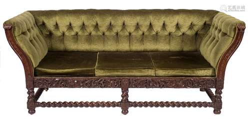 A late 19th Century carved oak three seat settee in the Carolean taste:,