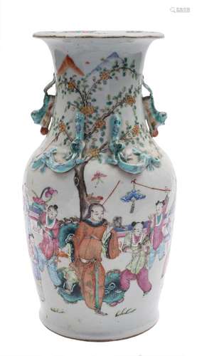 A Canton famille rose vase: the neck with lion dog handles and applied chilong,