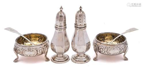 A pair of 19th century silver salts, all marks worn: crested, of circular outline,