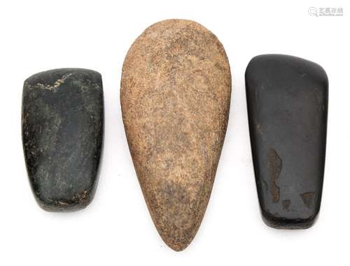 Two European Neolithic polished stone axe heads and an unpolished example circa 350 BC:.