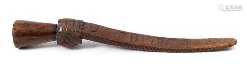 An 18th century fruitwood knitting sheath: with geometric decoration and initialled SB 1782, 18cm.