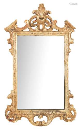 A carved giltwood and gesso wall mirror in the 18th Century style:,