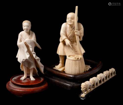 A Japanese carved ivory okimono of a peasant: surprised by a crab in his wicker basket, unsigned,