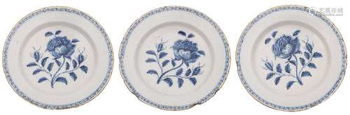 A set of three 18th century Dutch delftware blue and white dishes: each painted with a large single