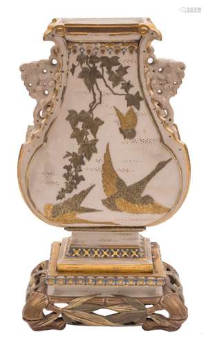 A Royal Worcester porcelain vase and stand in the Aesthetic taste: of flattened baluster form with