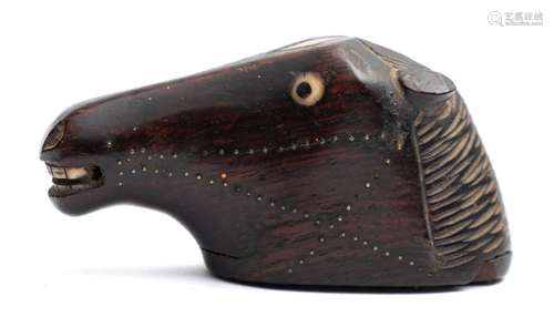 An unusual late George III carved rosewood snuff box in the form of a horse's head: with sliding