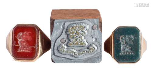 Two 9ct gold and hardstone mounted 'ram's head' seal rings together with a small rectangular wooden