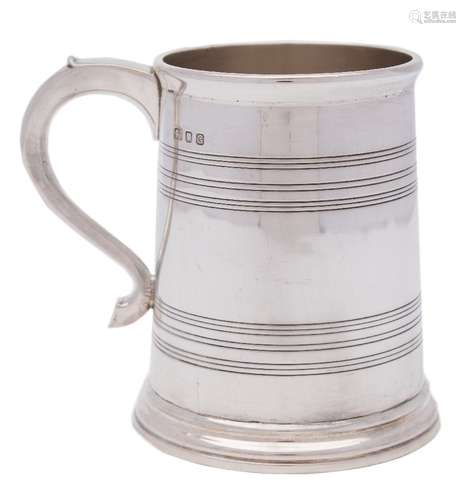 A George VI silver mug, maker's mark worn, London, 1942: of plain cylindrical form,