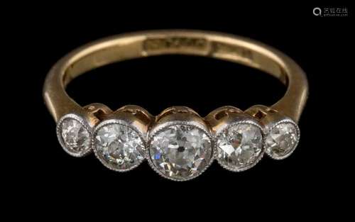 A graduated diamond five-stone ring: with round,