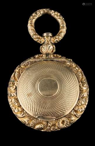 An early 19th century gold and 'filled gold' circular vinaigrette: with central engine-turned