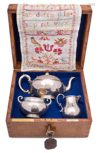 A Victorian silver presentation three-piece tea service, maker Edward & John Barnard, London,