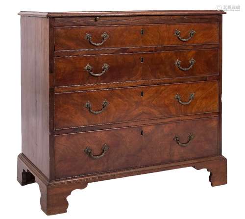 A George III mahogany rectangular chest:, the top with a moulded edge,