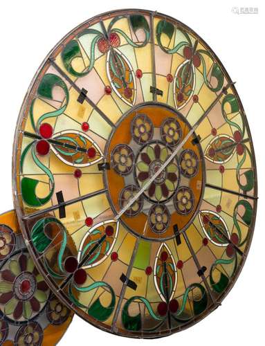 Two large and impressive 19th century large circular stained glass windows: with central