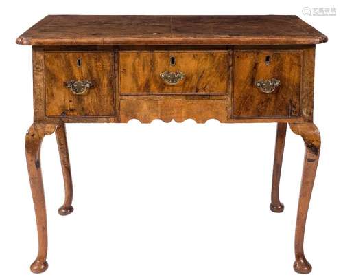 A walnut lowboy in the early 18th Century taste:,