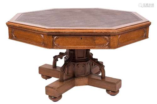 A Victorian Gothic oak octagonal library table in the manner of A W N Pugin:,