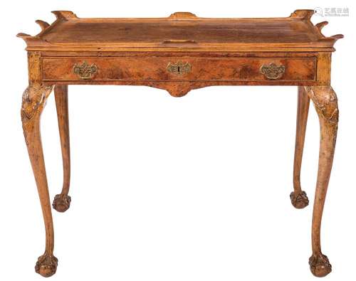 A burr walnut veneer silver table:, in the early 18th Century taste,