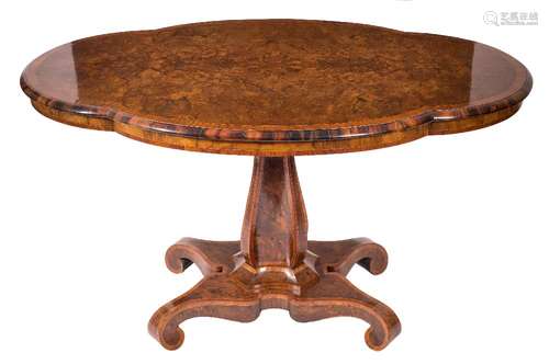 A Victorian burr walnut veneer and inlaid breakfast table:, of quatrefoil outline,