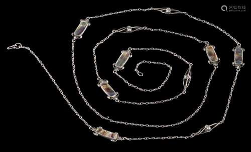 An Arts and Crafts silver and paua shell long chain: of handmade figure of eight links interspersed