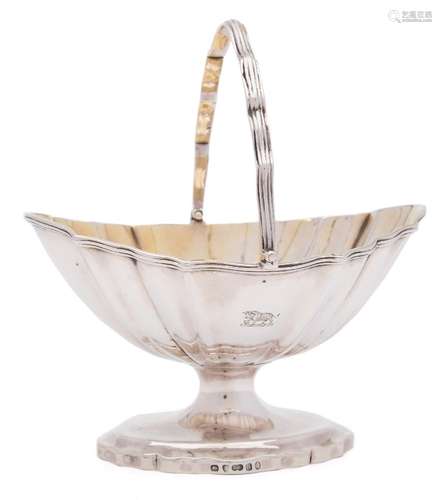 A George III silver swing handle sugar basket, maker William Fountain, London, 1795: crested,