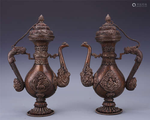 PAIR OF CHINESE BRONZE CARVED BUDDHA KETTLES