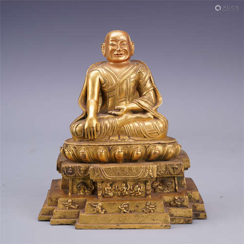 TIBETAN GILT BRONZE SEATED GURU