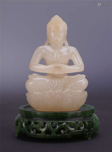 CHINESE WHITE JADE SEATED SAYKAMUNI ON SPINACH JADE BASE