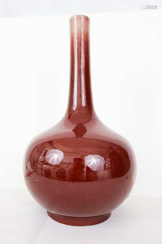 A QING DYNASTY RED GLAZE LONG NECK VASE