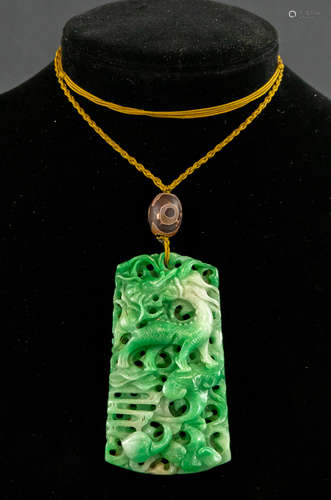 A JADEITE RUYI HOLLOW OUT PENDNAT