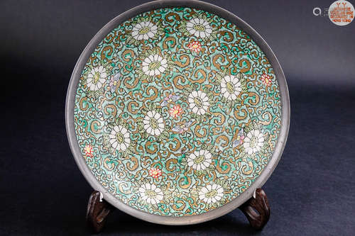 A PORCELAIN PLATE DECORATED IN GOLD WITH MARK