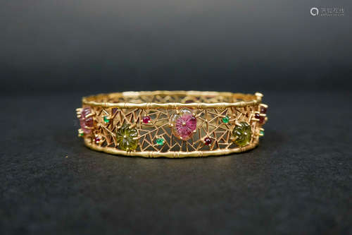 A 18K ROSE GOLD BRACELET EMBEDED WITH TOURMALINE