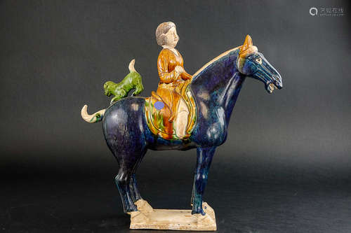 A THREE-COLOR HORSE-RIDING ORNAMENT