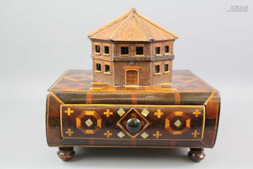 A 19th Century Parquetry Box; the box inlaid with mother-of-pearl and having model of a Methodist octagonal chapel to top, approx 28 x 22 x 23 cms