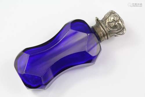 A Victorian Scent Bottle and Stopper, Bristol blue liner with original stopper and silver cover