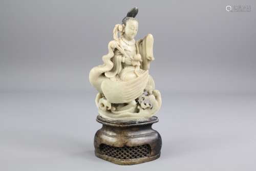 A Chinese Grey Soapstone Carving depicting Guanyin, approx 19 cms