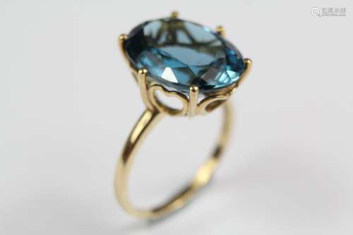 A 9ct Yellow Gold and Blue Stone Ring